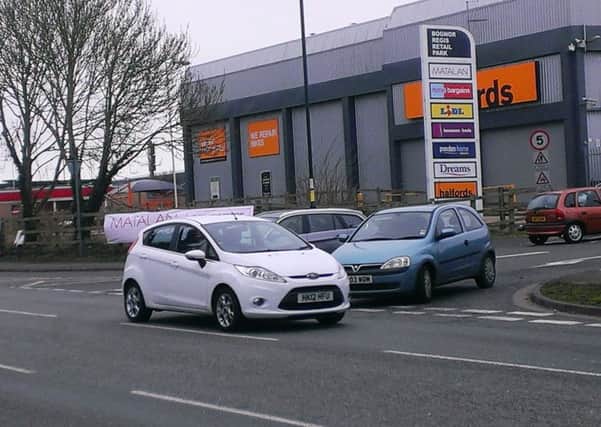Busy traffic conditions at the Rown Way entrance to the Bognor Regis Retail Park have been criticised SUS-160327-093205001