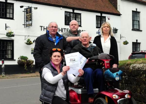 From front left Emma Yellop, Brian Allison, Kevin Farren, Eric Piper and Heidi Farren who are campaigning to save the pub
