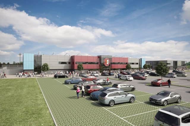 A computer generated concept image showing a view across the car park towards the football stadium.