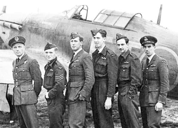 RAF pilots who took part in the Dieppe Raid in August 1942. This photograph was taken at Tangmere in West Sussex on the day after the action which saw 3,000 Allied sorties.