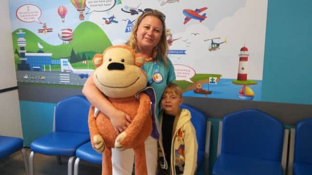 Helen Sadler and her son Barnaby, aged five, at the opening of the new hospital unit