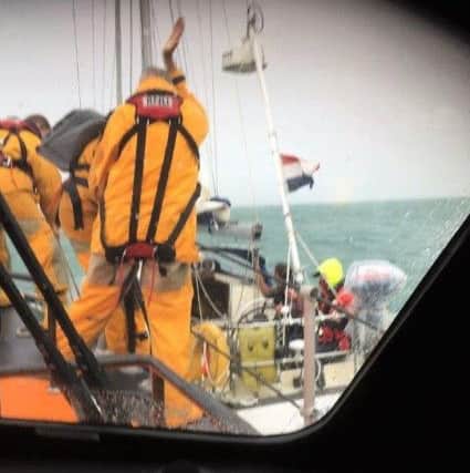 Pictures taken by the Selsey RNLI team show the dramatic rescue of a 12-metre yacht