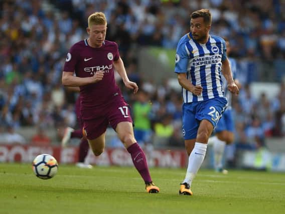 Kevin De Bruyne closes down Albion defender Markus Suttner. Picture by Phil Westlake (PW Sporting Photography)