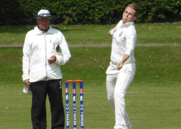 Josh Beeslee bowling for Bexhill against Ansty. Pictures by Simon Newstead