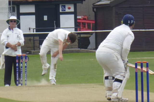 Bexhill overseas player Jake Lewis bowls to Ansty's top-scorer Leo Anderson.