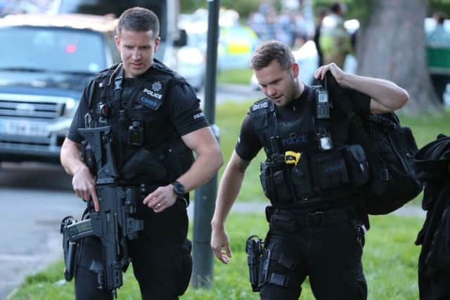 Armed police at the scene. Picture: Eddie Mitchell