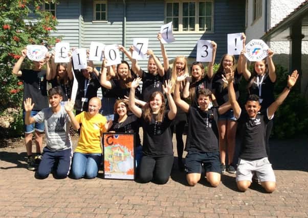 Members of NCS Team 1 Wave 2 celebrate their fundraising success for Chestnut Tree House children's hospice