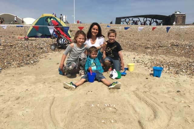Agnieszka Dybowski, 38, with her sons Kornel, eight, and Arthur, four and family friend Emilia Scholz, nine at the Littlehampton sandcastle competition