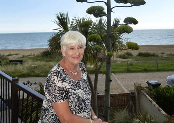 Brenda Tarrant with her rare agave tree in her garden at Pevensey Bay (Photo by Jon Rigby) SUS-171008-104540008