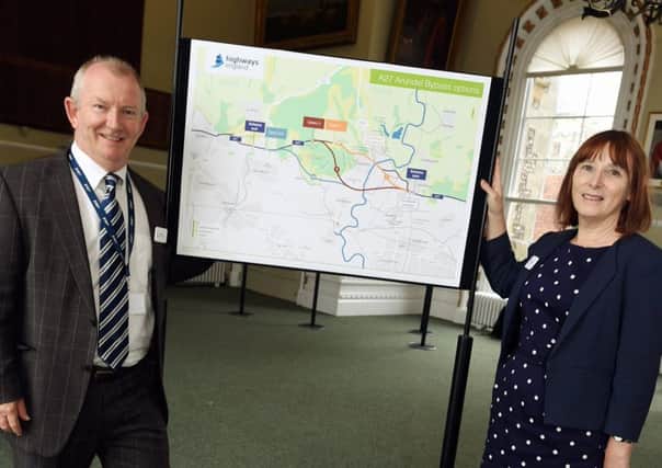 Alan Feist and Valerie Stephens from Highways England with the plans. Picture: Liz Pearce