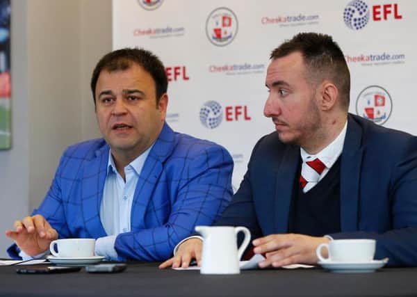 Crawley Town owner Ziya Eren, left, with director Selim Gayusuz at today's press conference at the Checkatrade Stadium.
Picture by James Boardman.