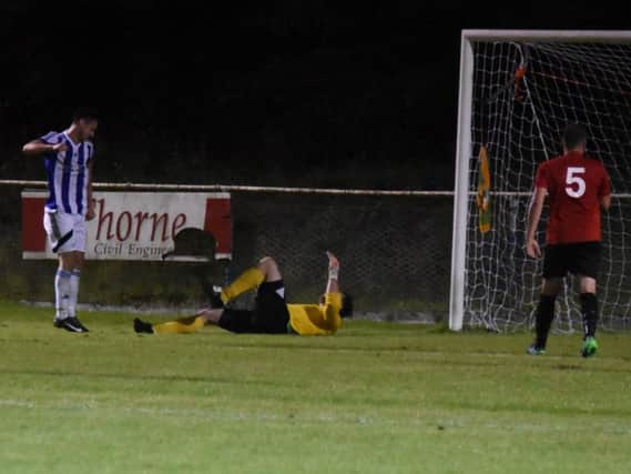Jamie Weston scores his second. Picture by Grahame Lehkyj