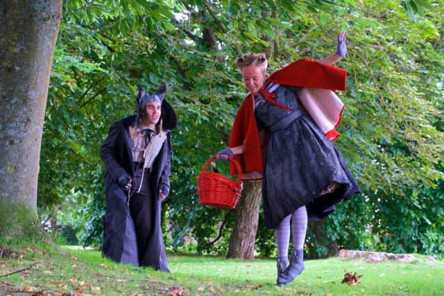 Hal Darling as The Wolf, Emily Wells as Little Red Riding Hood. Photo by Paul Inskip