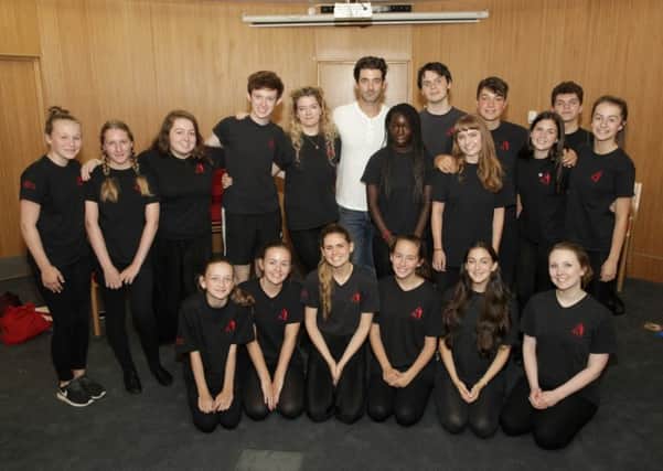 Oliver Tompsett with the Ariel students