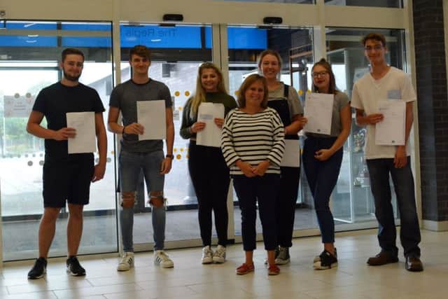 Students happy with their results with head of sixth Mrs Hook