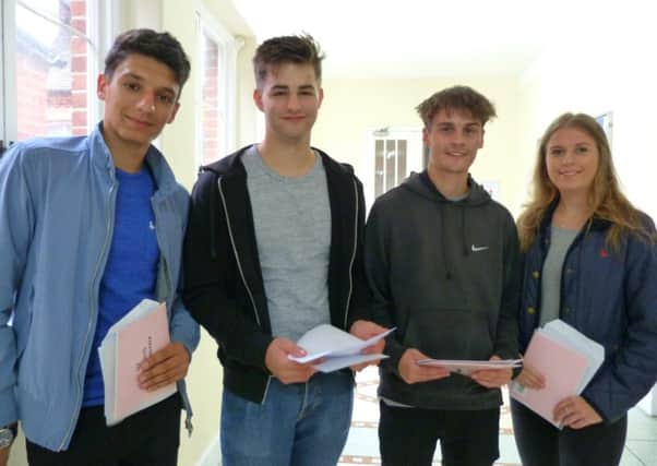Our Lady of Sion School students celebrating their results. From left: Gabriel Martin, Oliver Wakeling, Tom Jarmin and Mathilda Fuller