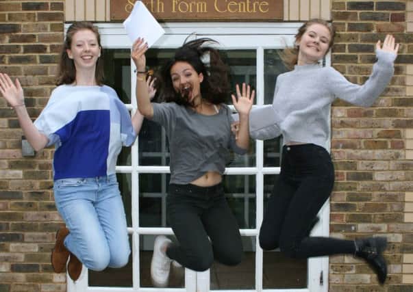 Students from Farlington Girls School, in Horsham, celebrate their 'outstanding results'