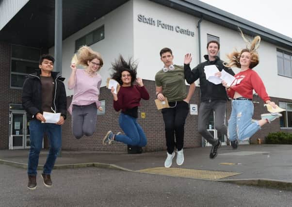 Angmering School students celebrate their results. Pictures: Liz Pearce