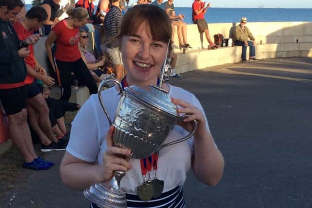 Georgina Pepper with the grand aggregate cup for the regatta.