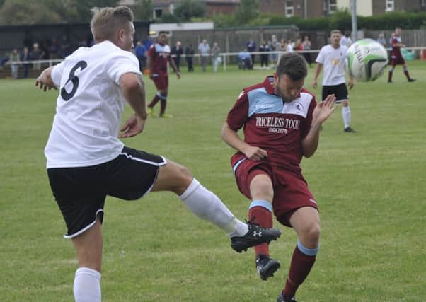 Action from Little Common's one previous home fixture this season, against Eastbourne United AFC in the FA Cup 13 days ago.