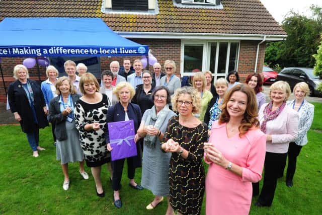 Gillian Keegan (in pink), Chichester MP, alongside St Wilfrid's staff and supporters at Monday's launch. Pictures Kate Shemilt ks171027-1