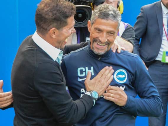 Brighton manager Chris Hughton with Atletico Madrid boss Diego Simeone. Picture by Phil Westlake (PW Sporting Photography)