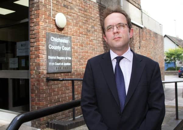 DM17840714a.jpg Lawyer Edward Cooke outside Chichester County Court. Photo by Derek Martin SUS-170817-171027008