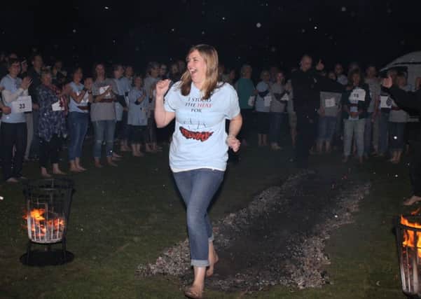 Hot to trot at the St Michael's and The Sara Lee Trust Fire Walk SUS-150428-145847001