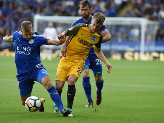 Solly March battles for the ball with Leicester City's Marc Albrighton. Picture by PW Sporting Pics