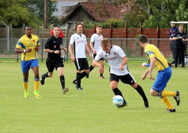 Action from the first game between Pagham and Sittingbourne / Picture by Roger Smith