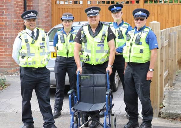 Hertfordshire police officers taking a wheelchair out on the streets to test drivers' parking. Pictures: Hertfordshire Constabulary