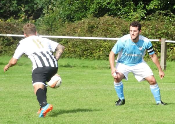 Bexhill United captain Craig McFarlane in action against St Francis Rangers. Picture courtesy Mark Killy
