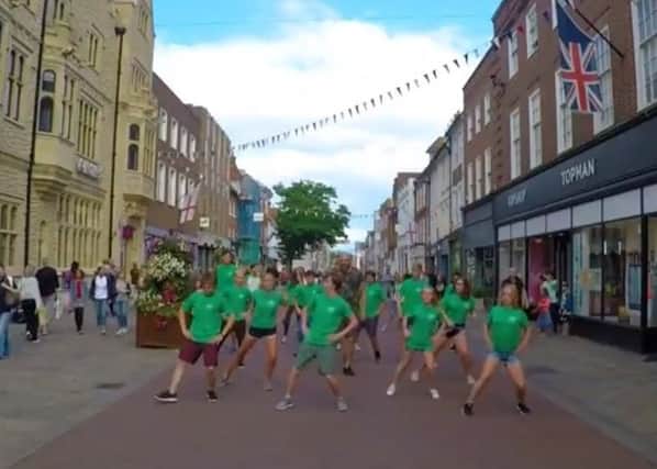 Sax Flash Mob was performed in Chichester by CLAC students