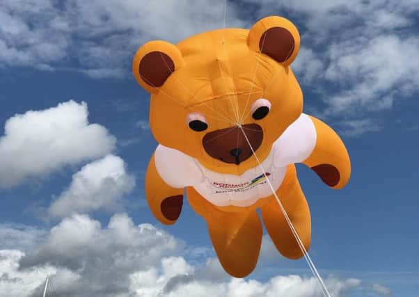 This giant, 39ft teddy bear kite is already flying ahead of this weekend's festival