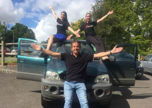 Dad Stephen Darnley, 56, with his two daughters, Anna, 24, and Laura, 20
