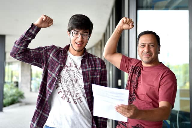 Hummd Ghouri with his father Ahmed from BACA in Brighton getting his GCSE results  (Photograph: Simon Dack / Vervate)