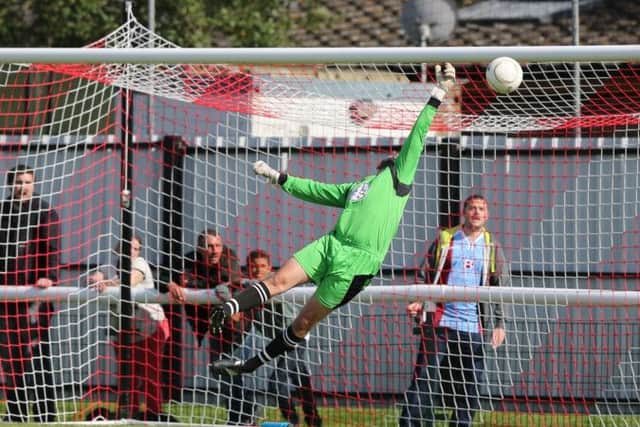 The Sheppey goalkeeper is beaten for the first Hastings goal. Picture courtesy Scott White
