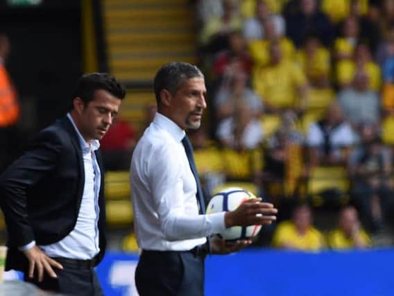 Brighton manager Chris Hughton on the touchline at Vicarage Road. Picture by PW Sporting Pics