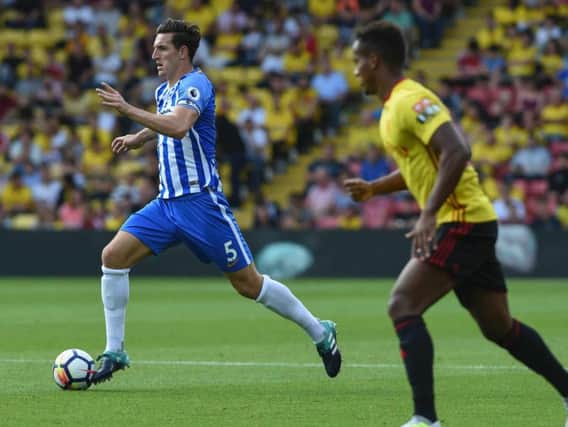 Lewis Dunk charges forward. Picture by Phil Westlake (PW Sporting Photography)