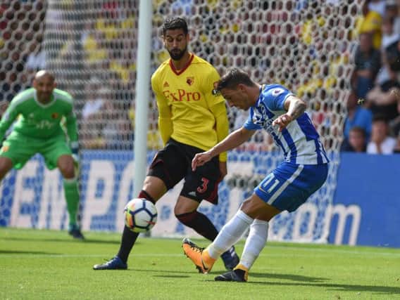 Anthony Knockaert gets a shot away under pressure from Miguel Britos. Picture by Phil Westlake (PW Sporting Photography)