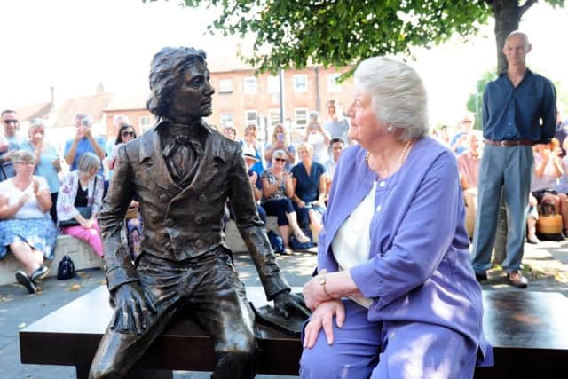 Dame Patricia Routledge unveils the new statue of Keats watched by the sculptor Vincent Gray
