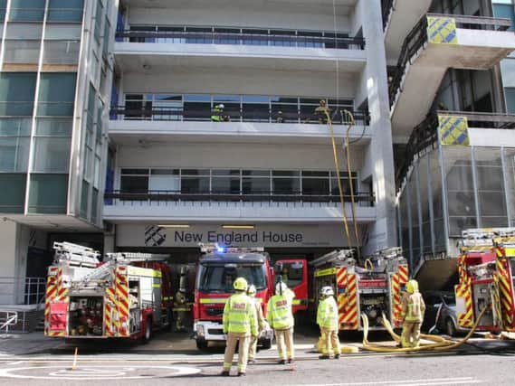 Firefighters undertaking a training exercise at New England House (Photograph: Eddie Mitchell)