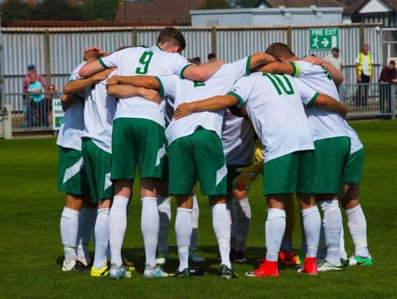 Rocks' pre-match huddle prior to the Bank Holiday Monday clash with Eastbourne Borough. Picture by Tommy McMillan