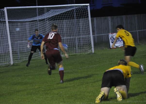 Little Common on the attack against Seaford Town. Pictures by Simon Newstead