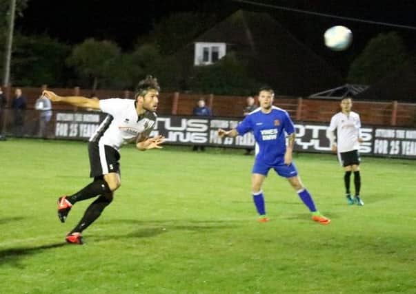 Joe Booker nets for Pagham / Picture by Roger Smith