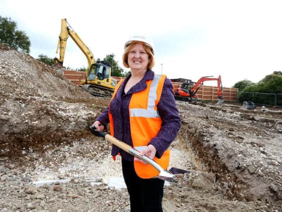 Cllr Anne Meadows marks the start of work at Lynchet Close