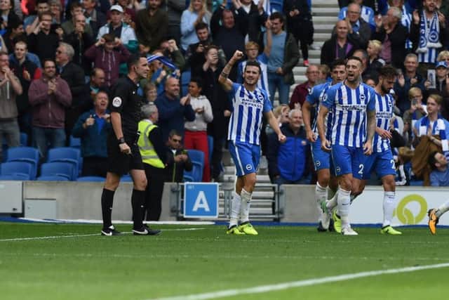 Pascal Gross and his Brighton & Hove Albion team-mates celebrate their first Premier League goal. Picture by PW Sporting Pics