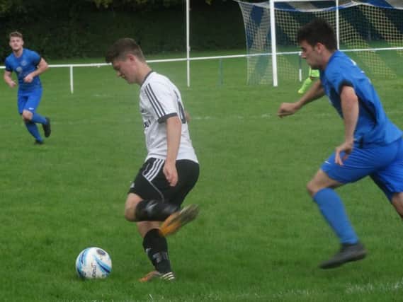 Ryan Harffey on the ball for Bexhill United against Midhurst & Easebourne. Picture courtesy Mark Killy