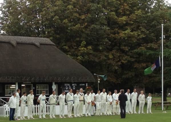 Goodwood and Chichster cricketers stand to pay tribute to the Duke of Richmond