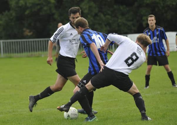 Action from the Division Two fixture between Hollington United II and Bexhill United II. Pictures by Simon Newstead